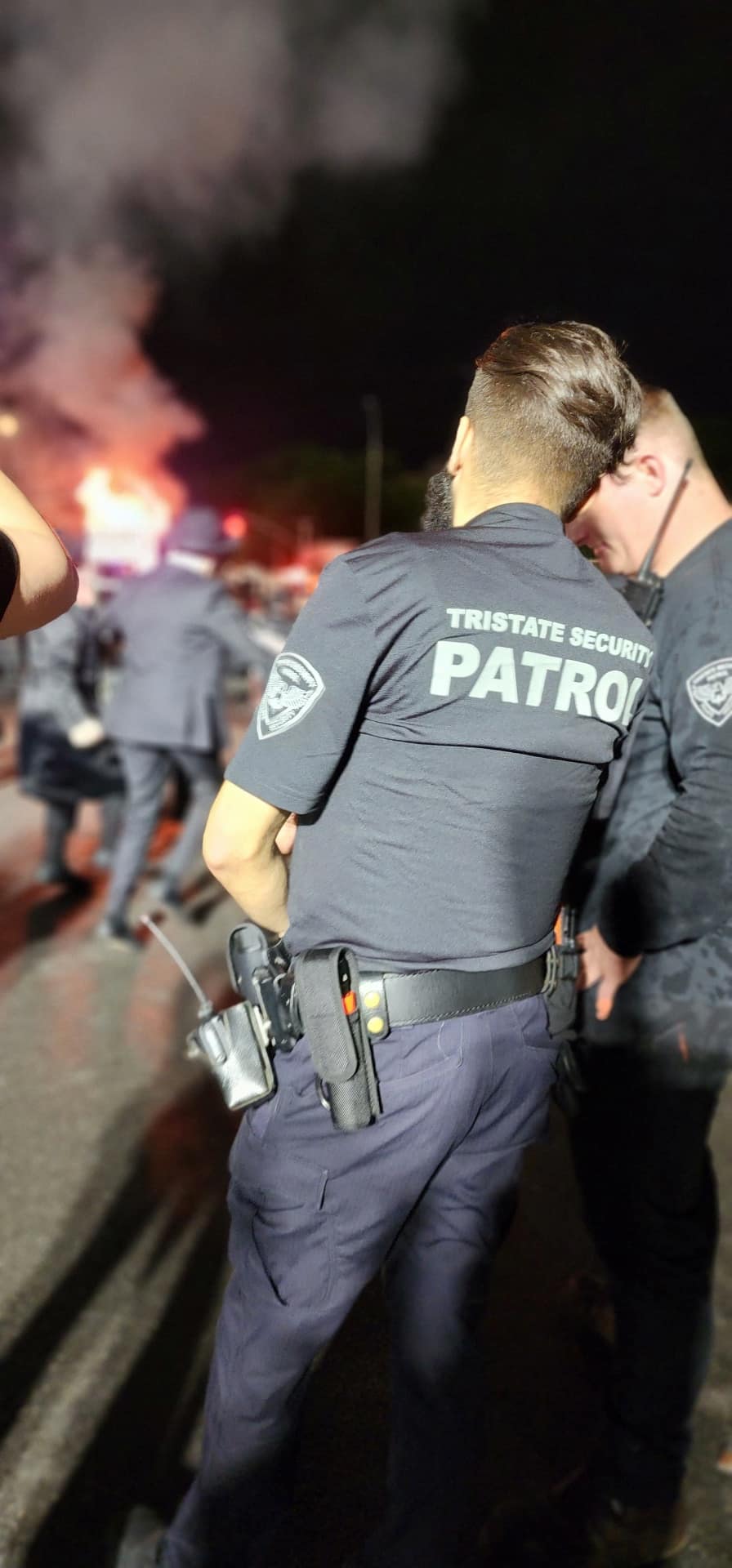 Tristate security officer using a radio