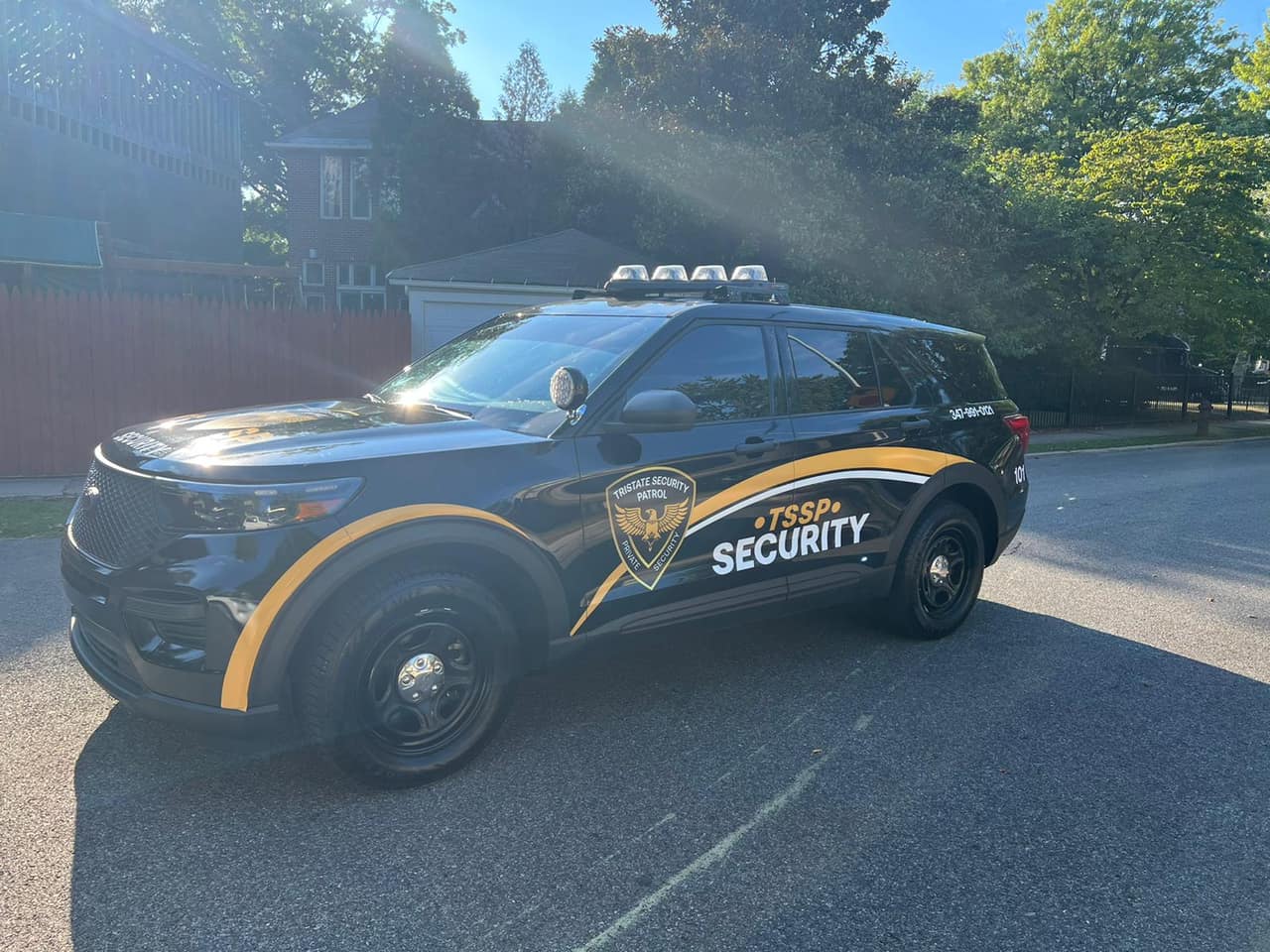 Tristate marked patrol vehicle on a residential street